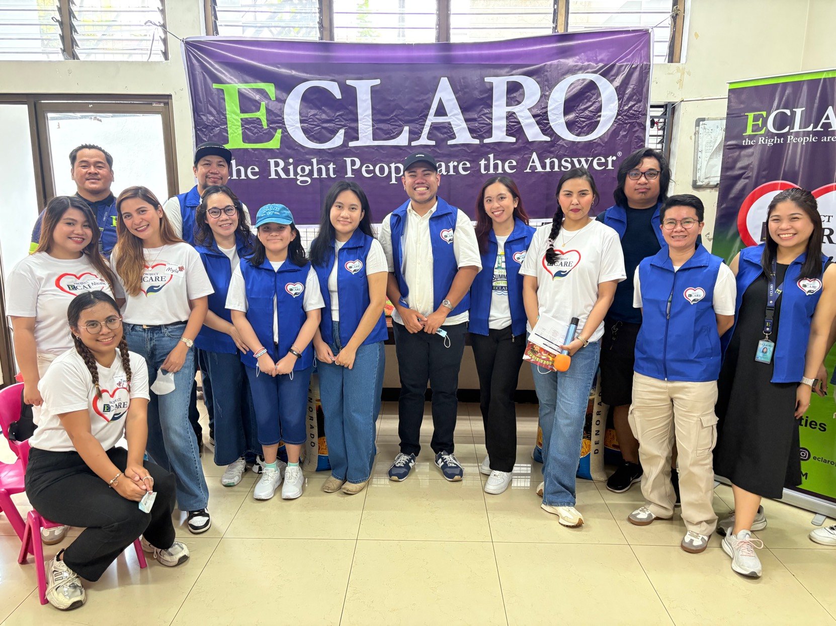 ECLARO Project E-Care Volunteers posing in classroom