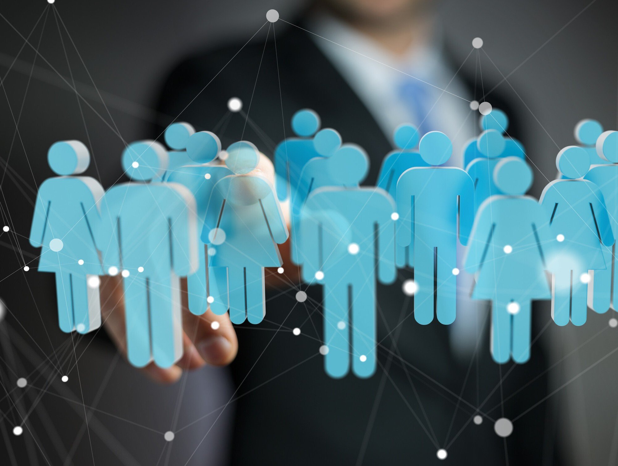 Illustrations of men and women representing workforce with man behind